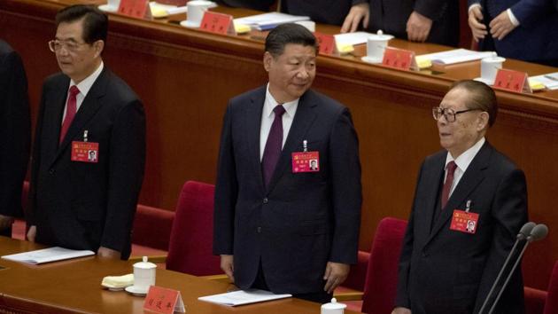 Xi Jinping (C), former President Jiang Zemin (R), and former President Hu Jintao (L) at the opening ceremony of the 19th Party Congress in Beijing. Xi told the congress that the nation’s prospects are bright but challenges are severe, pledging that the party would have ‘zero tolerance’ for corruption and would ‘continue to purify, improve and reform itself’ — an indication that it would not allow outside checks on graft. (Ng Han Guan / AP)