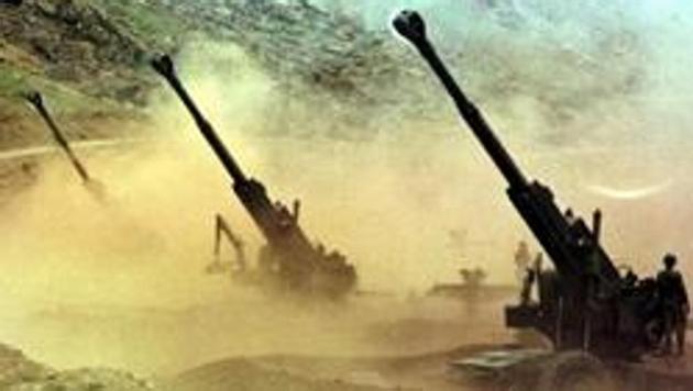 Indian artillery men fire 155mm Bofors guns at enemy positions from a gun emplacement in Drass sector of Kashmir. (AFP) Indian artillery men fire 155mm Bofors guns at enemy positions from a gun emplacement in Drass sector of Kashmir. (AFP)
