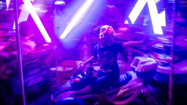 A boy enjoys a ride on a human-powered illuminated carousel during the Thadinkyut festival in Yangon. Myanmar’s festival of lights, known locally as the Thadingyut festival, is held during the full moon of the lunar month of Thadingyut. (Ye Aung Thu / AFP)