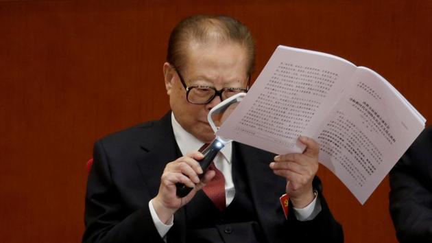 Former Chinese President Jiang Zemin reads through President Xi’s report during the congress. Key questions include whether Xi ally and top corruption-buster Wang Qishan will stay on past traditional retirement age. Another measure of Xi’s power will be whether he manages to have his own political philosophy added to the constitution, elevating him to the level of leaders like Mao Zedong and Deng Xiaoping. (Jason Lee / REUTERS)