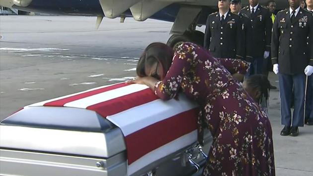 In this Tuesday, Oct. 17, 2017, frame from video, Myeshia Johnson cries over the casket in Miami of her husband, Sgt. La David Johnson, who was killed in an ambush in Niger. (AP) In this Tuesday, Oct. 17, 2017, frame from video, Myeshia Johnson cries over the casket in Miami of her husband, Sgt. La David Johnson, who was killed in an ambush in Niger. (AP)