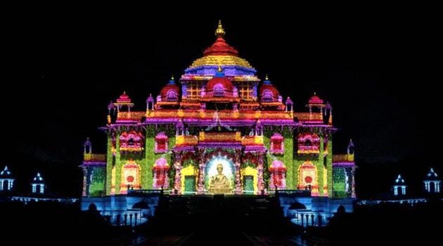 The Swaminarayan Akshardham temple is illuminated with laser lights projections as a part of Diwali celebrations in Gandhinagar, Gujarat. (PTI)
