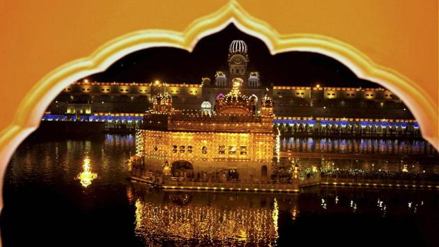 A view of the Golden Temple illuminated on the eve the Diwali in Amritsar, Punjab. (PTI)