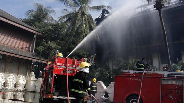 Firefighters put out fire at a burnt building caused by a fire at the Kandawgyi Palace Hotel Thursday, Oct. 19, 2017, in Yangon, Myanmar. (AP Photo) Firefighters put out fire at a burnt building caused by a fire at the Kandawgyi Palace Hotel Thursday, Oct. 19, 2017, in Yangon, Myanmar. (AP Photo)