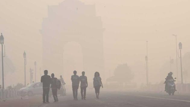 People walk near the India Gate a day after Diwali, in New Delhi. (Arvind Yadav/HT Photo) People walk near the India Gate a day after Diwali, in New Delhi. (Arvind Yadav/HT Photo)