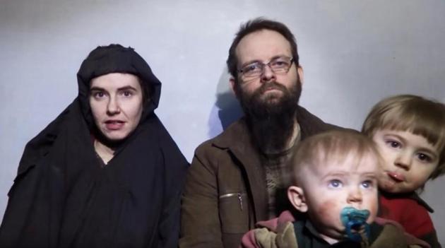A still image from a video posted by the Taliban on social media on December 19, 2016 shows American Caitlan Coleman (L) speaking next to her Canadian husband Joshua Boyle and their two sons. (Reuters) A still image from a video posted by the Taliban on social media on December 19, 2016 shows American Caitlan Coleman (L) speaking next to her Canadian husband Joshua Boyle and their two sons. (Reuters)