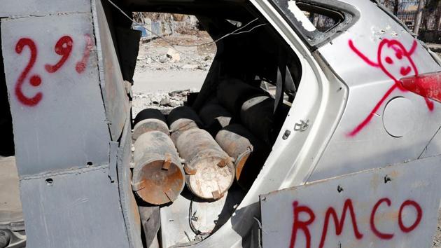 Bombs inside a vehicle used by the Islamic State militants in suicide car bombings are left defused by a de-mining team in Raqqa, Syria on October 18, 2017. SDF spokesman Mustefa Bali told AFP that a formal announcement of the liberation of the city would only come once de-mining is completed. (Erik De Castro / REUTERS)