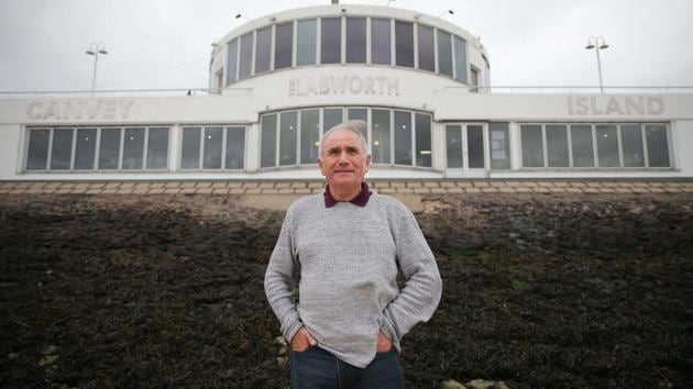 Leader of the Canvey Island Independent Party (CIIP), Dave Blackwell poses outside the Labworth Cafe, at the seafront on Canvey Island, Essex on October 20, 2017. (AFP) Leader of the Canvey Island Independent Party (CIIP), Dave Blackwell poses outside the Labworth Cafe, at the seafront on Canvey Island, Essex on October 20, 2017. (AFP)
