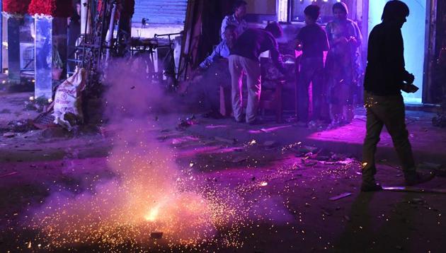 This picture taken on October 19, 2017 shows people using firecrackers celebrating Diwali in New Delhi. (AFP) This picture taken on October 19, 2017 shows people using firecrackers celebrating Diwali in New Delhi. (AFP)