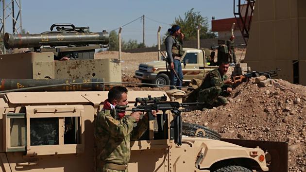 Kurdish security forces stand guard in their defensive positions in Alton Kupri, outskirts of Irbil, Iraq, Thursday Oct. 19. 2017. (AP Photo) Kurdish security forces stand guard in their defensive positions in Alton Kupri, outskirts of Irbil, Iraq, Thursday Oct. 19. 2017. (AP Photo)