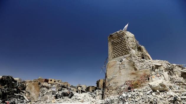 The destroyed al-Hadba minaret at the Grand al-Nuri Mosque is seen in the Old City of Mosul, Iraq on July 20, 2017. Nine months of fighting in the west of Mosul, where militants holed up during their final stand left the area virtually uninhabitable. Before ISIS captured the city, Mosul was home to 1.1 million people. UN officials estimate that just restoring basic services there could cost more than $1 billion. (Thaier Al-Sudani / REUTERS)
