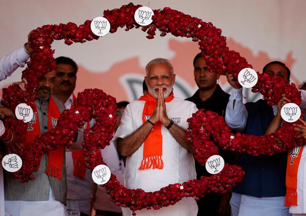 Prime Minister Narendra Modi is garlanded by supporters at a public rally in Ahmedabad on October 16. Modi’s home state Gujarat is due for assembly elections in December. (Reuters file photo) Prime Minister Narendra Modi is garlanded by supporters at a public rally in Ahmedabad on October 16. Modi’s home state Gujarat is due for assembly elections in December. (Reuters file photo)