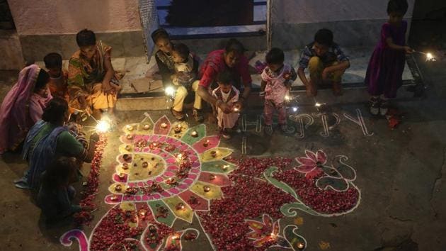 Pakistani Hindu families decorate their house to celebrate Diwali, the Hindu festival of lights, in Karachi on October 19, 2017. (AP Photo) Pakistani Hindu families decorate their house to celebrate Diwali, the Hindu festival of lights, in Karachi on October 19, 2017. (AP Photo)