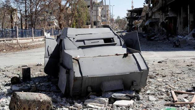 An armoured Islamic State vehicle intended for suicide car bombing is seen along a road in Raqqa, Syria on October 18, 2017. US-backed SDF forces are now combing the ruins of the Syrian city for survivors, bombs and booby traps. (Erik De Castro / REUTERS)