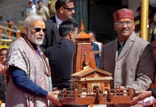 Prime Minister Narendra Modi is felicitated by Uttrakhand Chief Minister Trivendra Singh Rawat during his visit to Kedarnath in Uttarakhand on Friday. (PTI) Prime Minister Narendra Modi is felicitated by Uttrakhand Chief Minister Trivendra Singh Rawat during his visit to Kedarnath in Uttarakhand on Friday. (PTI)