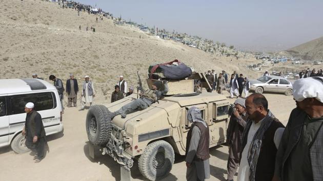 Afghan security police patrol near the cemetery, where victim of Friday's suicide attack at the Shiite mosque were buried, in Kabul, Afghanistan on October 21. (AP Photo) Afghan security police patrol near the cemetery, where victim of Friday's suicide attack at the Shiite mosque were buried, in Kabul, Afghanistan on October 21. (AP Photo)