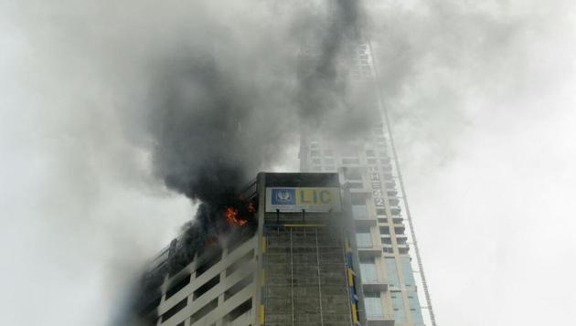 Smoke billows out from Jeevan Sudha building, an LIC office beside Maidan metro station after a fire broke out in Kolkata on Thursday. (Samir Jana / HT Photo) Smoke billows out from Jeevan Sudha building, an LIC office beside Maidan metro station after a fire broke out in Kolkata on Thursday. (Samir Jana / HT Photo)