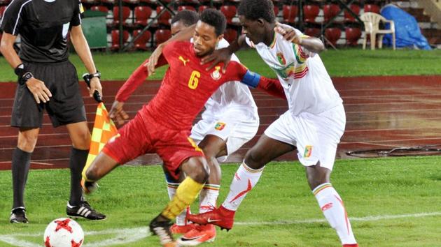 Ghana (red) and Mali's players vie for the ball during their FIFA U-17 World Cup match. (PTI)