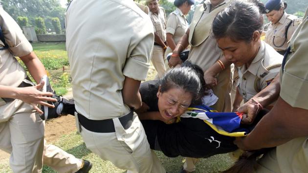 A Tibetan protestor is whisked away by the police outside the Chinese embassy in New Delhi. Nearly two dozen members of the Tibetan Youth Congress on Wednesday protested against a second five-year term for Chinese President Xi Jinping as the 19th Communist Party Congress opened in Beijing. (Sonu Mehta / HT Photo) A Tibetan protestor is whisked away by the police outside the Chinese embassy in New Delhi. Nearly two dozen members of the Tibetan Youth Congress on Wednesday protested against a second five-year term for Chinese President Xi Jinping as the 19th Communist Party Congress opened in Beijing. (Sonu Mehta / HT Photo)