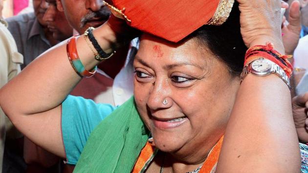 Rajasthan chief minister Vasundhara Raje wears a turban during a function in Ajmer/(PTI FILE)