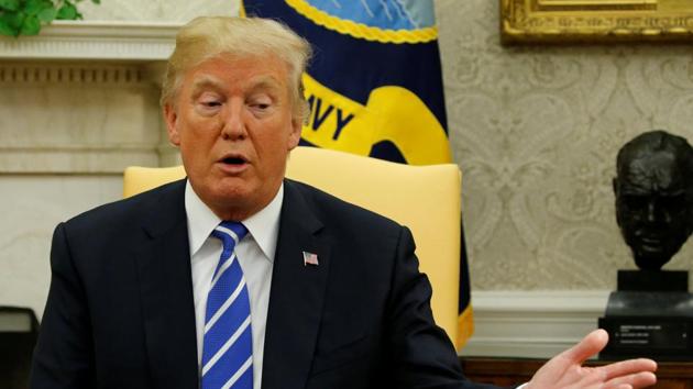 US President Donald Trump delivers remarks to reporters in the Oval Office at the White House in Washington on October 20. (Reuters) US President Donald Trump delivers remarks to reporters in the Oval Office at the White House in Washington on October 20. (Reuters)