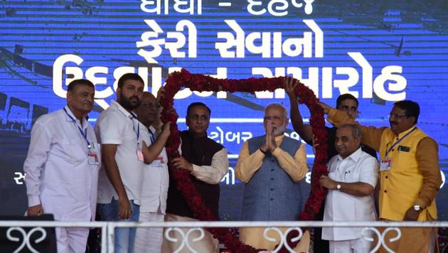 Prime Minister Narendra Modi felicitated at an event in Gujarat on Sunday. (Photo tweeted by PMO India) Prime Minister Narendra Modi felicitated at an event in Gujarat on Sunday. (Photo tweeted by PMO India)