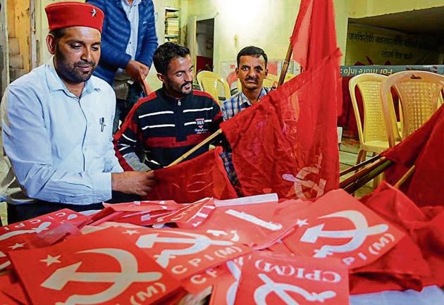 Communist Party of India (Marxist) workers arrange their party flags ahead of the assembly polls at the party office in Shimla on Saturday. Left parties, with a presence in some pockets of Himachal, have failed to leave a mark in the state politics. (Deepak Sansta/HT) Communist Party of India (Marxist) workers arrange their party flags ahead of the assembly polls at the party office in Shimla on Saturday. Left parties, with a presence in some pockets of Himachal, have failed to leave a mark in the state politics. (Deepak Sansta/HT)