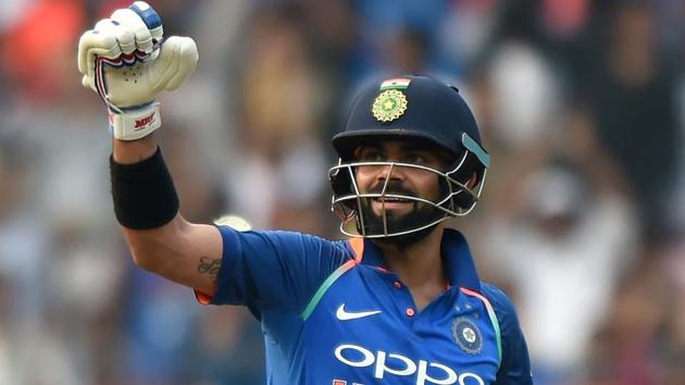 Indian team captain Virat Kohli celebrates after scoring a century. (AFP)