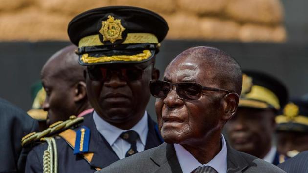 This file photo taken on April 12, 2017 shows Zimbabwe's President Robert Mugabe attending the burial of Brigadier General James Murozvi, who was granted national hero status by President Robert Mugabe, at the National Heroes Acre in Harare. (AFP File Photo) This file photo taken on April 12, 2017 shows Zimbabwe's President Robert Mugabe attending the burial of Brigadier General James Murozvi, who was granted national hero status by President Robert Mugabe, at the National Heroes Acre in Harare. (AFP File Photo)