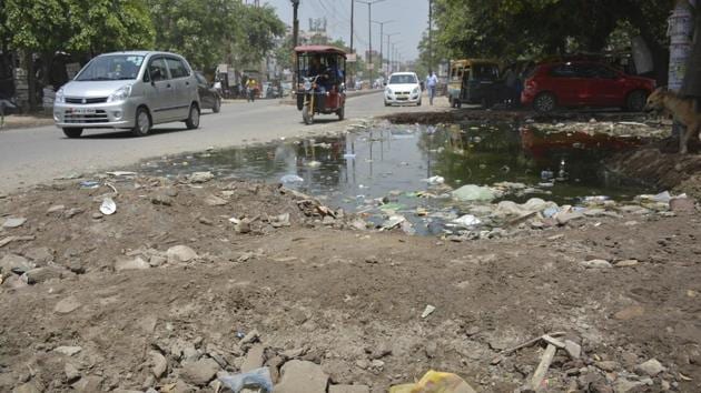 Ghaziabad, India - June 14: Broken roads at ESI hospital on road Rajendar Nagar in Ghaziabad, India, on Wednesday, June 14, 2016. UP had launched a drive to fill up potholes on as many as 11,107 roads within 40 days ie by June 15, with the Yogi Adityanath government allotting nearly Rs 1,400 crore for the work. (HT File) Ghaziabad, India - June 14: Broken roads at ESI hospital on road Rajendar Nagar in Ghaziabad, India, on Wednesday, June 14, 2016. UP had launched a drive to fill up potholes on as many as 11,107 roads within 40 days ie by June 15, with the Yogi Adityanath government allotting nearly Rs 1,400 crore for the work. (HT File)
