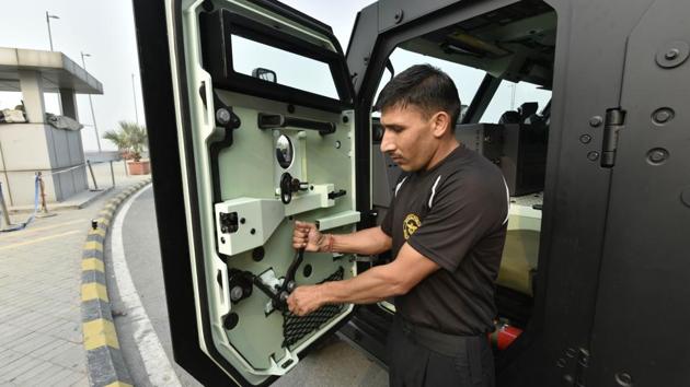‘The vehicle is bulletproof with four gates. Every gate has a space to put a gun out of it and a bulletproof glass above the space so that the personnel can see the target. The vehicle can run at a speed of 120km/hr and is fully automatic,’ said a CISF officer, who has been trained in using the vehicle. (Vipin Kumar / HT Photo)