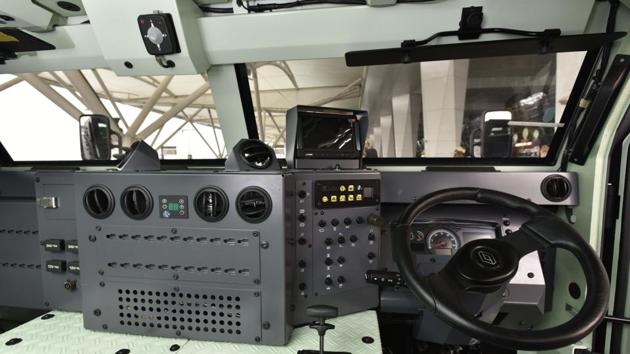 ‘There is a screen inside next to the driver’s seat where CCTV footage is displayed. The vehicle cannot be opened from the outside without the key. There are different lights installed at the front of the vehicle to operate in dark. The wheels are good enough to travel in mud and bad roads,’ a CISF officer told HT. (Vipin Kumar / HT Photo)