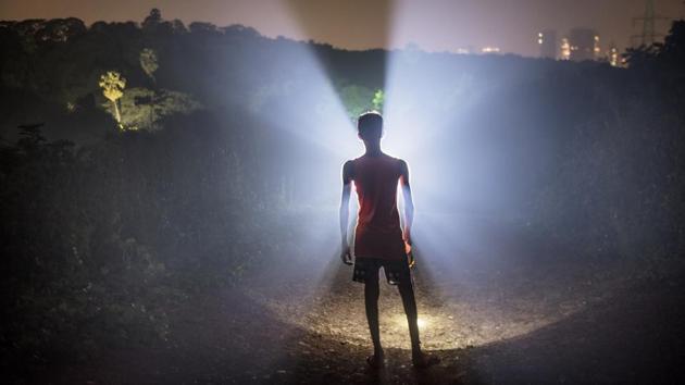 Locals travel through the green lung in the evening. The forest department blames Aarey authorities for not providing civic amenities to these hamlets, which has led to increased conflicts. ‘The leopards and the Warlis are the original inhabitants of Aarey. There will be a solution only once the government acknowledges this and pays heed to their needs,’ said wildlife biologist Vidya Athreya, a sign that the issue is transforming from an ecological problem to a political one. (Satish Bate / HT Photo)