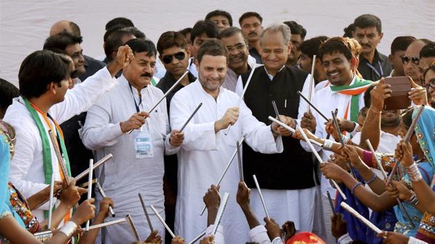 Congress vice president Rahul Gandhi participates in a cultural dance during a public meeting in Gandhinagar on Monday.(PTI)