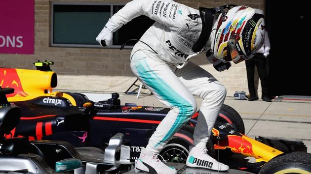 Lewis Hamilton of Great Britain and Mercedes GP celebrates in parc ferme during the United States Grand Prix. (AFP) Lewis Hamilton of Great Britain and Mercedes GP celebrates in parc ferme during the United States Grand Prix. (AFP)
