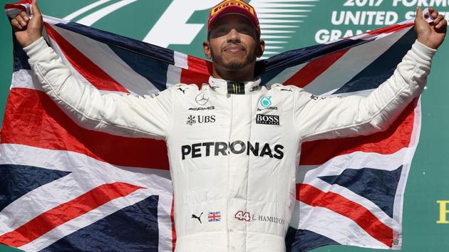 Lewis Hamilton of celebrates on the podium after winning the United States Formula One Grand Prix. (AFP) Lewis Hamilton of celebrates on the podium after winning the United States Formula One Grand Prix. (AFP)