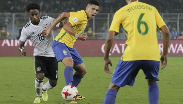 Brazil's Paulinho duels for the ball against Germany's John Yeboah during their FIFA U-17 World Cup quarter final match. (AP) Brazil's Paulinho duels for the ball against Germany's John Yeboah during their FIFA U-17 World Cup quarter final match. (AP)