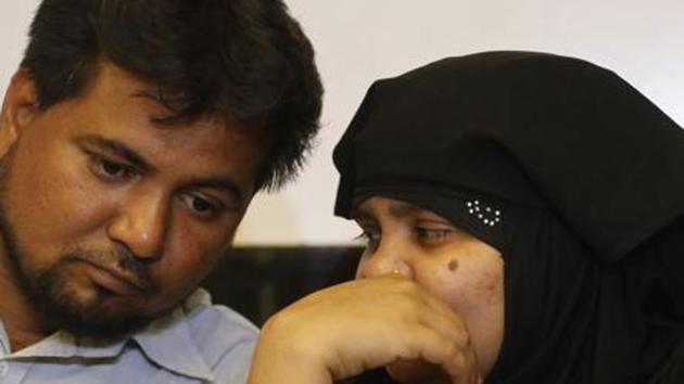 Bikis Bano with her husband Yakub Rasool. Eleven men were convicted for raping Bano – who was then five-months pregnant - and murdering seven of her family members in 2002. (AP file photo) Bikis Bano with her husband Yakub Rasool. Eleven men were convicted for raping Bano – who was then five-months pregnant - and murdering seven of her family members in 2002. (AP file photo)