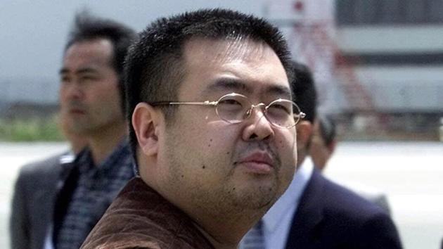 In this May 4, 2001, file photo, a man believed to be Kim Jong Nam, the eldest son of then North Korean leader Kim Jong Il, looks at a battery of photographers as he exits a police van to board a plane to Beijing at Narita international airport in Narita, northeast of Tokyo. (AP Photo) In this May 4, 2001, file photo, a man believed to be Kim Jong Nam, the eldest son of then North Korean leader Kim Jong Il, looks at a battery of photographers as he exits a police van to board a plane to Beijing at Narita international airport in Narita, northeast of Tokyo. (AP Photo)