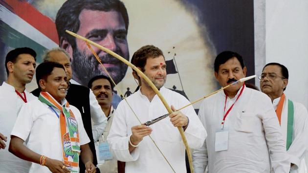 Congress vice president Rahul Gandhi presented a bow and an arrow at a public meeting at Devghad Bariya village of Dahod district. (PTI FILE) Congress vice president Rahul Gandhi presented a bow and an arrow at a public meeting at Devghad Bariya village of Dahod district. (PTI FILE)