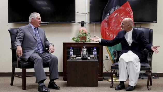 US secretary of state Rex Tillerson speaks with Afghan President Ashraf Ghani at the Bagram Air Field in Afghanistan.(AP)