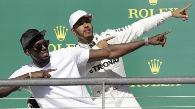 Usain Bolt, left, and Mercedes driver Lewis Hamilton, of Britain, pose at the United States Grand Prix. (AP) Usain Bolt, left, and Mercedes driver Lewis Hamilton, of Britain, pose at the United States Grand Prix. (AP)