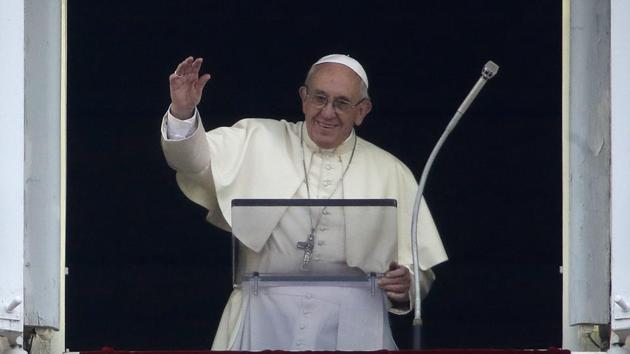 Pope Francis waives during the Angelus noon prayer in St. Peter's Square at the Vatican, Sunday, October 22, 2017.) (AP Photo) Pope Francis waives during the Angelus noon prayer in St. Peter's Square at the Vatican, Sunday, October 22, 2017.) (AP Photo)