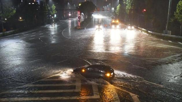 A water-covered road lashed by heavy rains is seen in Nagoya, Japan on October 22, 2017. Apart from those killed, two others were left comatose by injuries and one man was missing, NHK public television said. Nearly 90 others suffered minor injuries. (Kyodo / via REUTERS) A water-covered road lashed by heavy rains is seen in Nagoya, Japan on October 22, 2017. Apart from those killed, two others were left comatose by injuries and one man was missing, NHK public television said. Nearly 90 others suffered minor injuries. (Kyodo / via REUTERS)