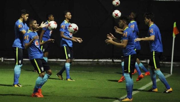 Brazil footballers practice ahead of their FIFA U-17 World Cup match against England in Kolkata. (SAMIR JANA/HT Photo)