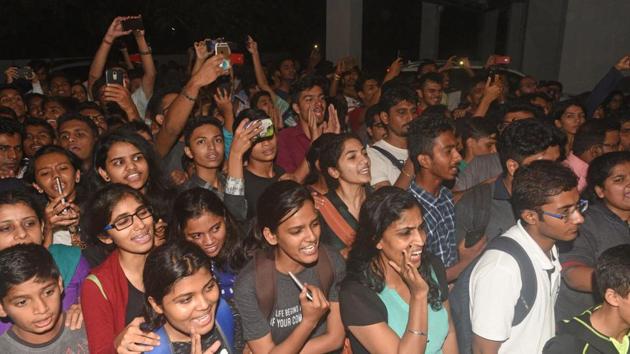 Fans outside Kedar Jadhav's house in Kothrud in Pune. (Pratham Gokhale/HT Photo) 
