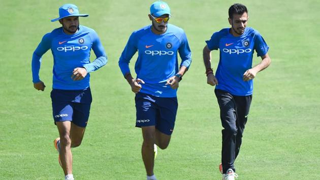 Indian cricketers Manish Pandey (L), Axar Patel (C) and Yuzvendra Chahal jog during the training session. (AFP) 