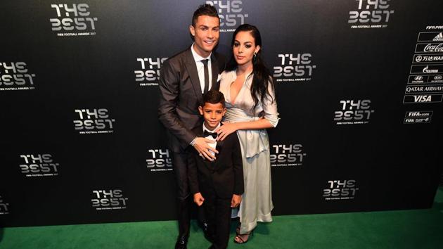 Ronaldo (L) came to the ceremony with partner Georgina Rodriguez (R) and son Cristiano Ronaldo Jr. (AFP)