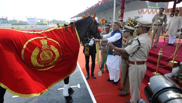 Union home minister Rajnath Singh felicitates Black Beauty, a thoroughbred, during the 56th Raising Day of the Indo Tibetan Border Police force in Greater Noida on Tuesday. (Sunil Ghosh/HT Photo) Union home minister Rajnath Singh felicitates Black Beauty, a thoroughbred, during the 56th Raising Day of the Indo Tibetan Border Police force in Greater Noida on Tuesday. (Sunil Ghosh/HT Photo)