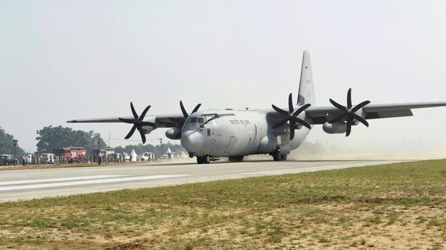 An Indian Air Force transport aircraft, a C-130 Hercules lands on the Lucknow-Agra Expressway during an IAF drill in Bangarmau, in Unnao district on Tuesday.(PTI Photo)